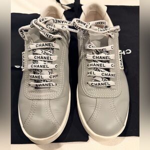 CHANEL Gray Sneakers with Logo Laces